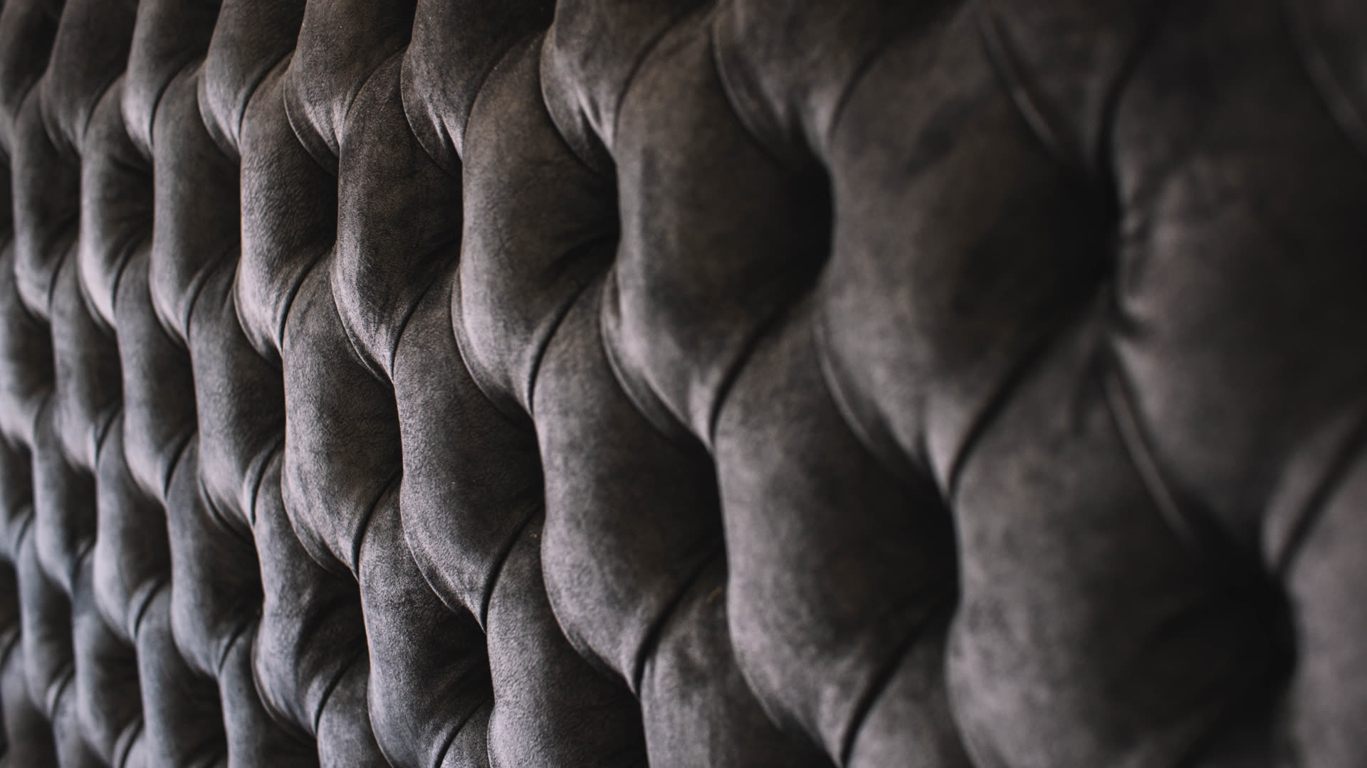 D3 deep-button upholstery close-up