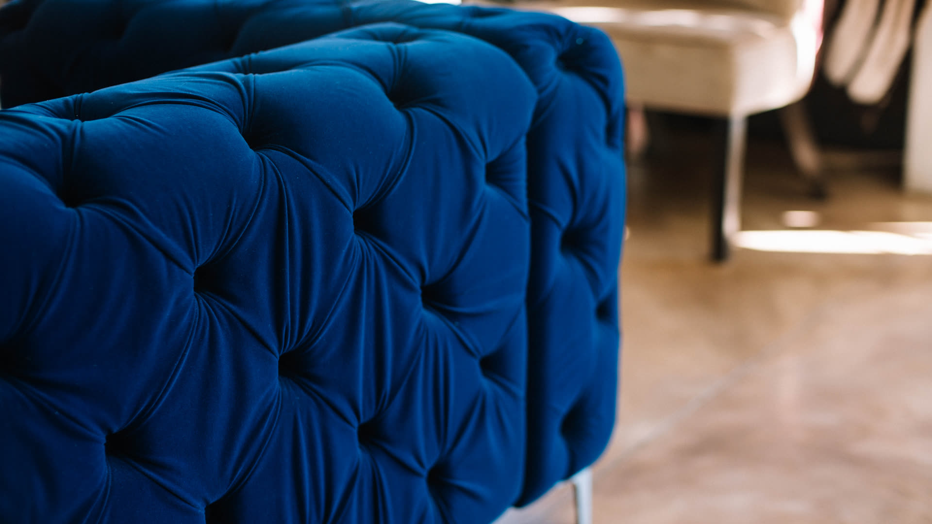 D3 blue deep-button upholstery detail