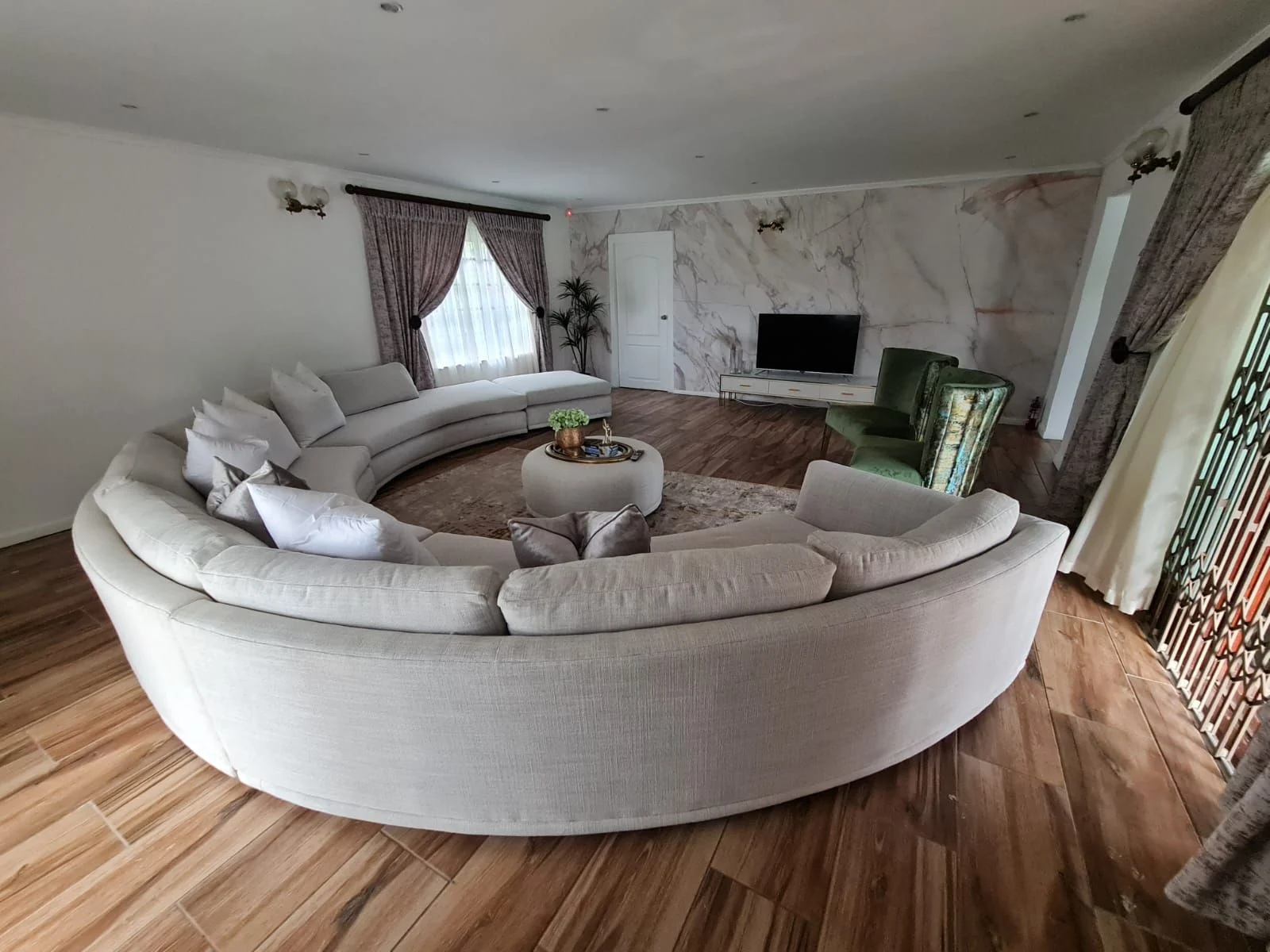D3 Bikani curved sofa in a real home
